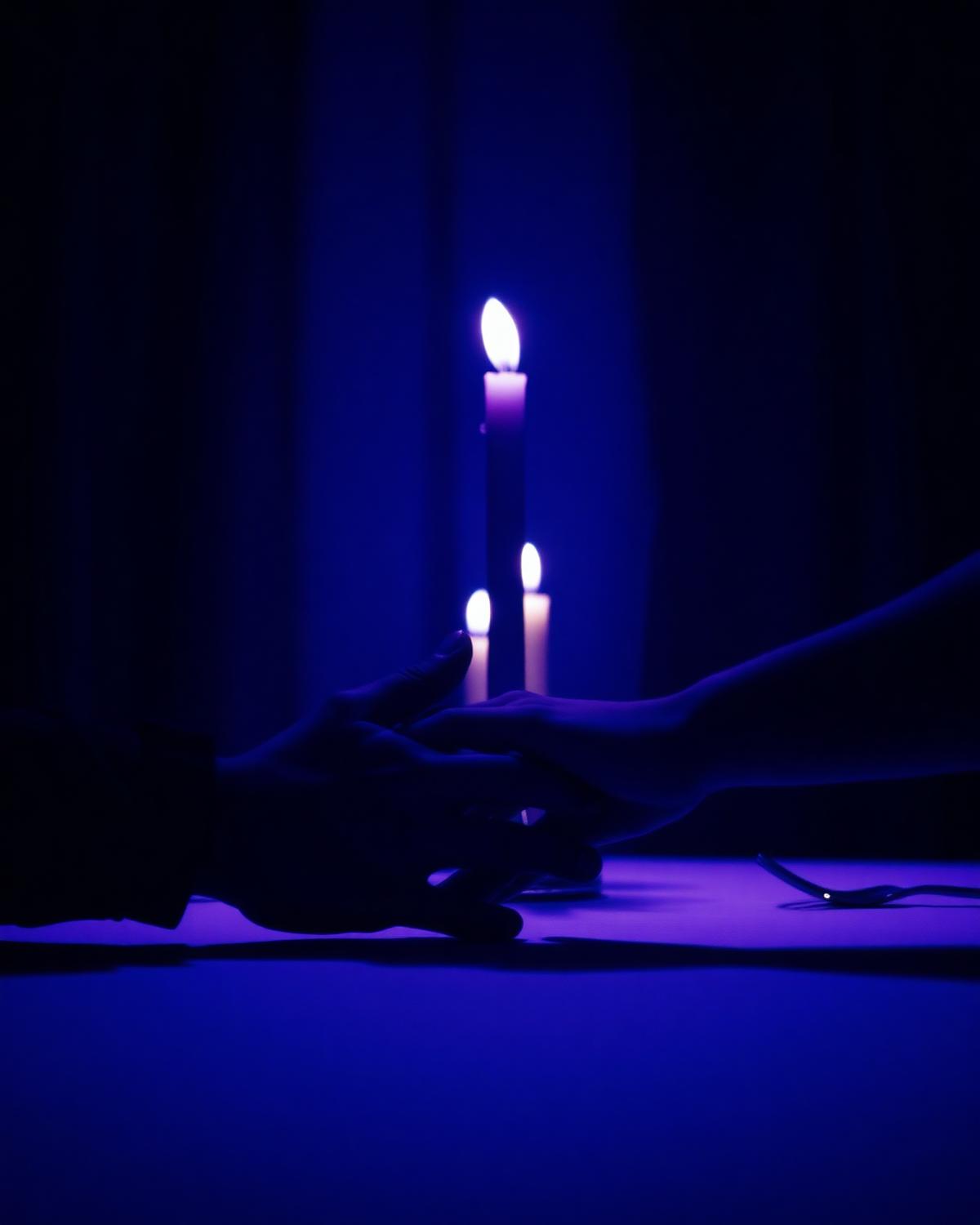 Candle-lit hands